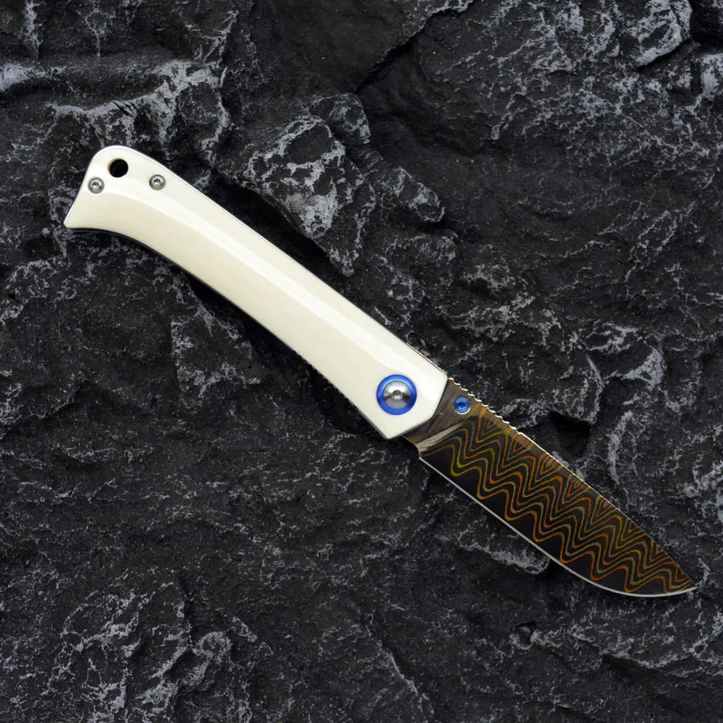 Damascus Folding Knife – Winged Avian with G10 Handle & Zirconium Inlay with 59HRC detail image - detail view 3