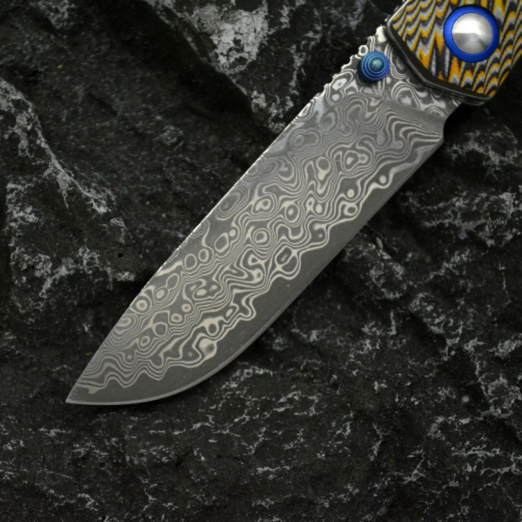 Damascus Folding Knife – Winged Avian with G10 Handle & Zirconium Inlay with 59HRC detail image - detail view 4