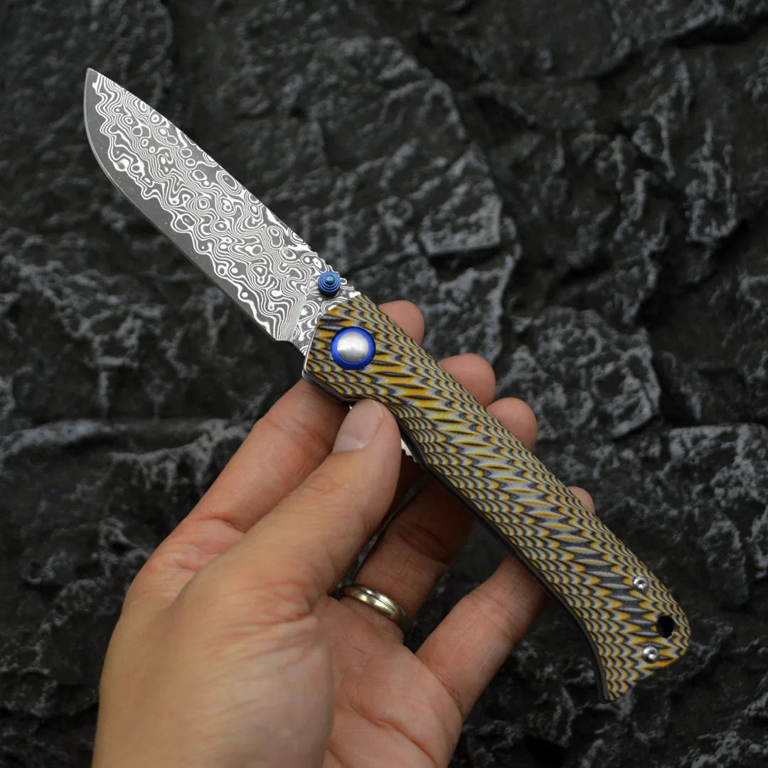 Damascus Folding Knife – Winged Avian with G10 Handle & Zirconium Inlay with 59HRC detail image - detail view 5