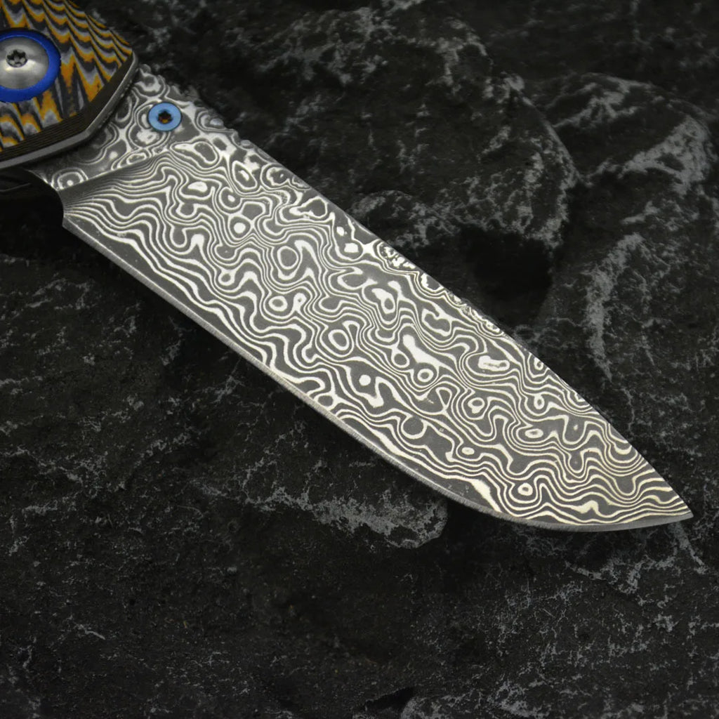 Damascus Folding Knife – Winged Avian with G10 Handle & Zirconium Inlay with 59HRC detail image - detail view 6