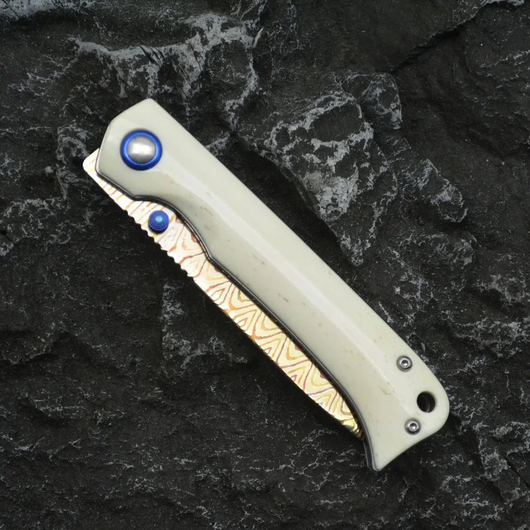 Damascus Folding Knife – Winged Avian with G10 Handle & Zirconium Inlay with 59HRC detail image - detail view 7