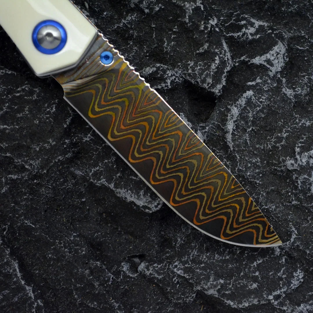 Damascus Folding Knife – Winged Avian with G10 Handle & Zirconium Inlay with 59HRC detail image - detail view 9