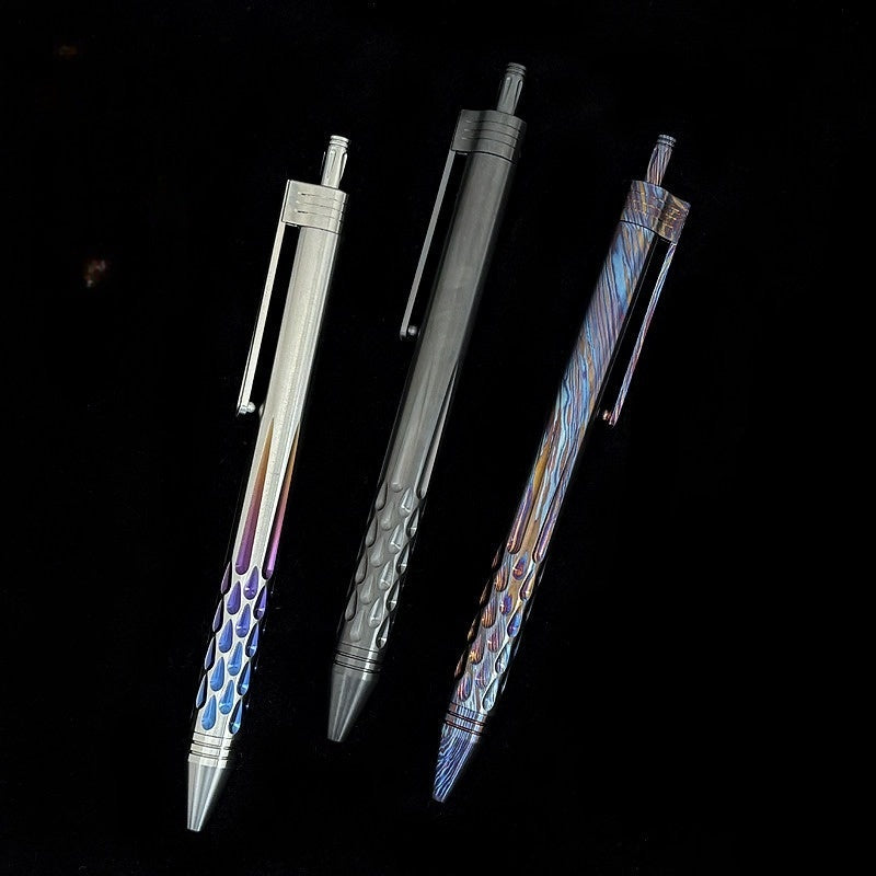 Damascus Tactical Pen – Titanium with CNC Engraved Titanium / Zirconium / Steel Writing detail image