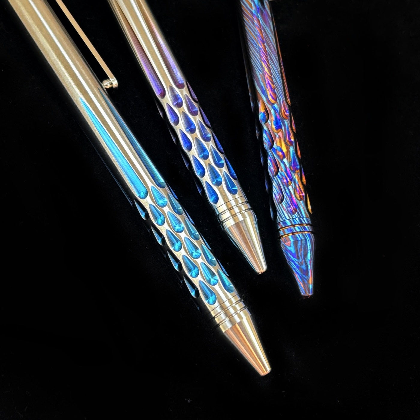 Damascus Tactical Pen – Titanium with CNC Engraved Titanium / Zirconium / Steel Writing detail image - detail view 3