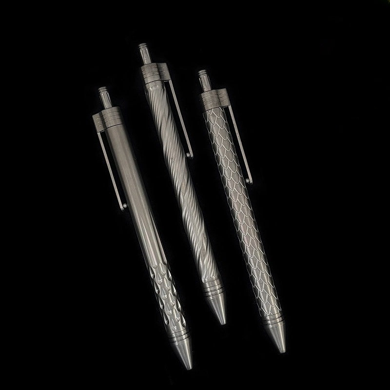 Damascus Tactical Pen – Titanium with CNC Engraved Titanium / Zirconium / Steel Writing detail image - detail view 4